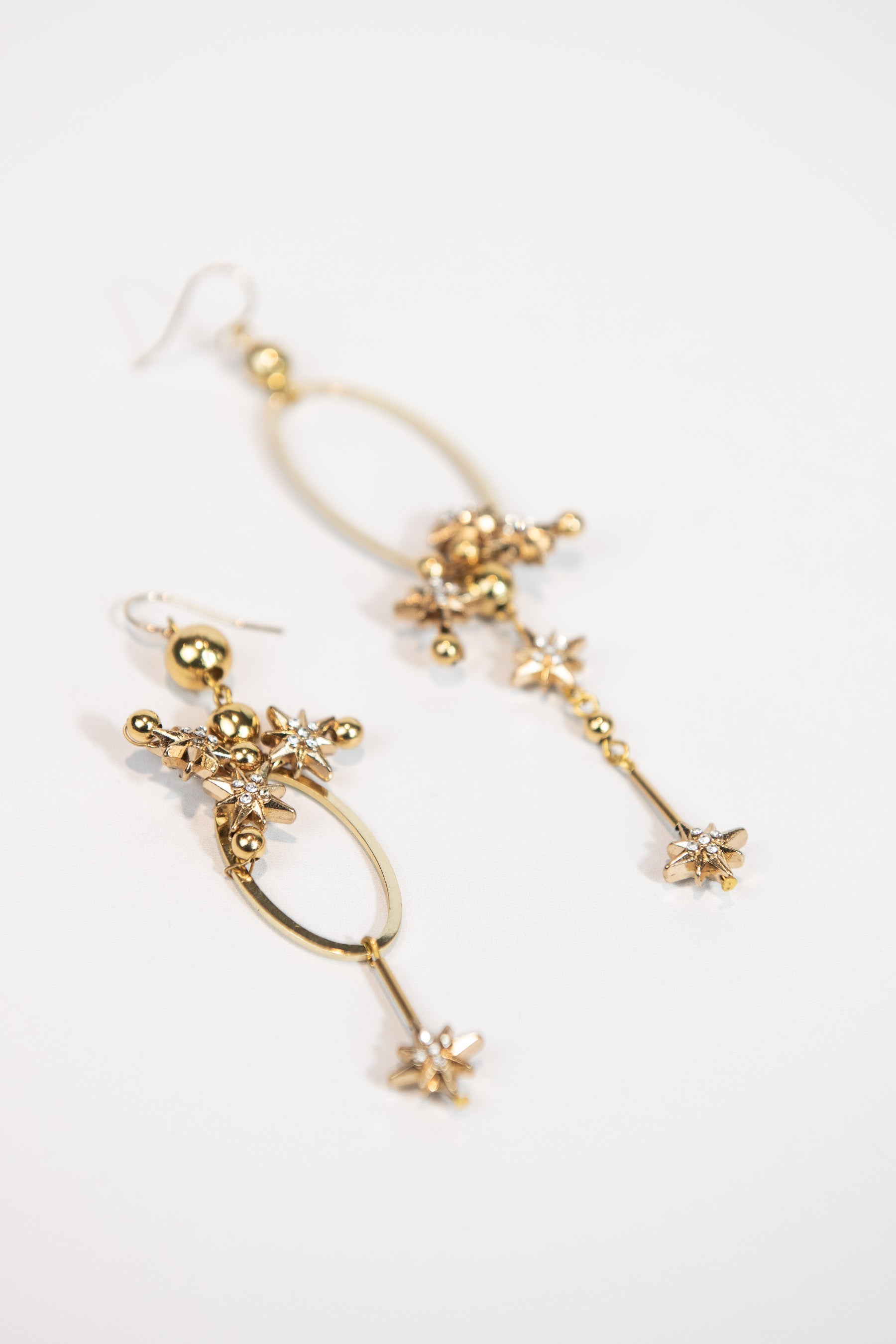 Asymmetrical celestial oval drop earrings - gold