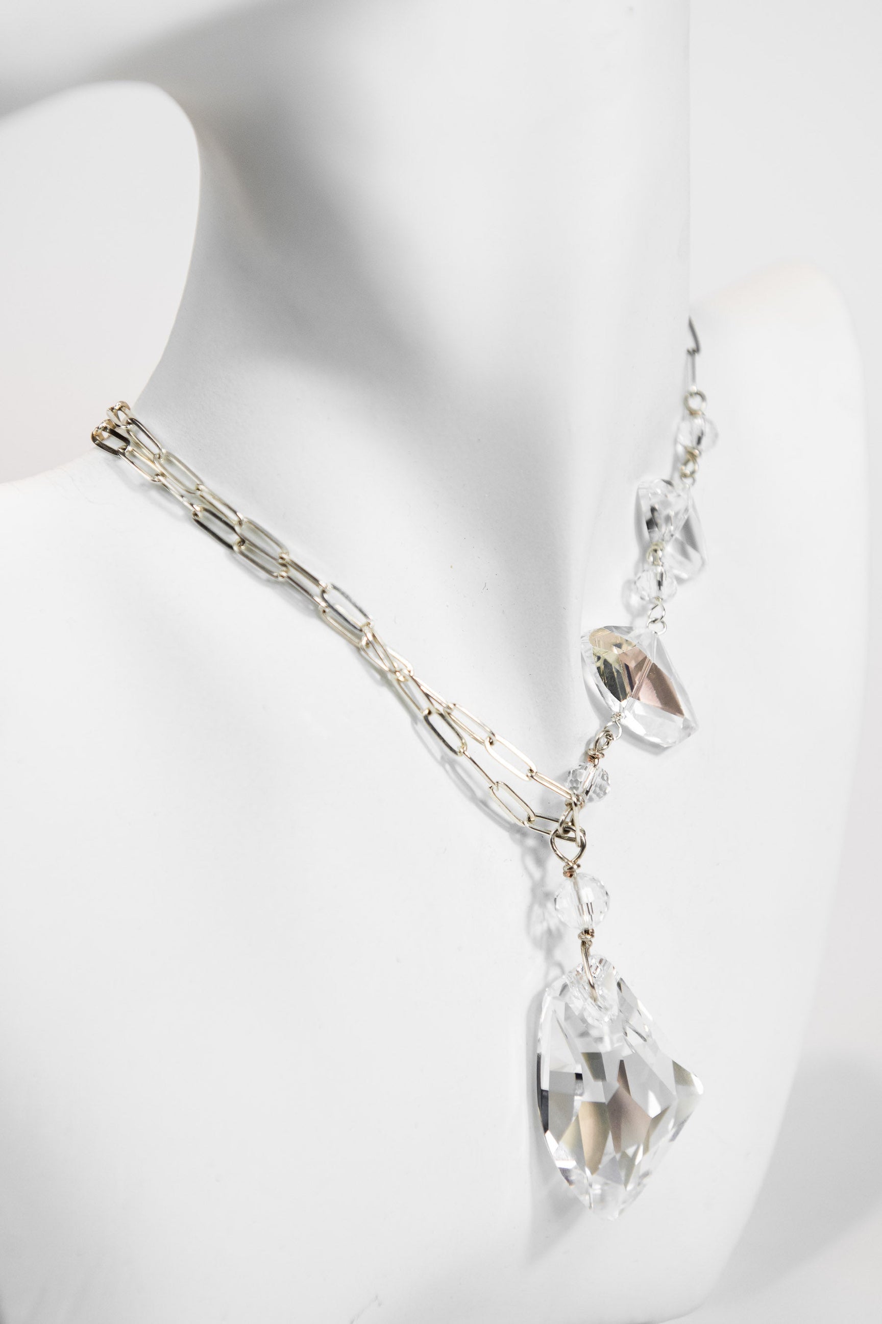 Silver chain link necklace with asymmetrical Swarovski crystals