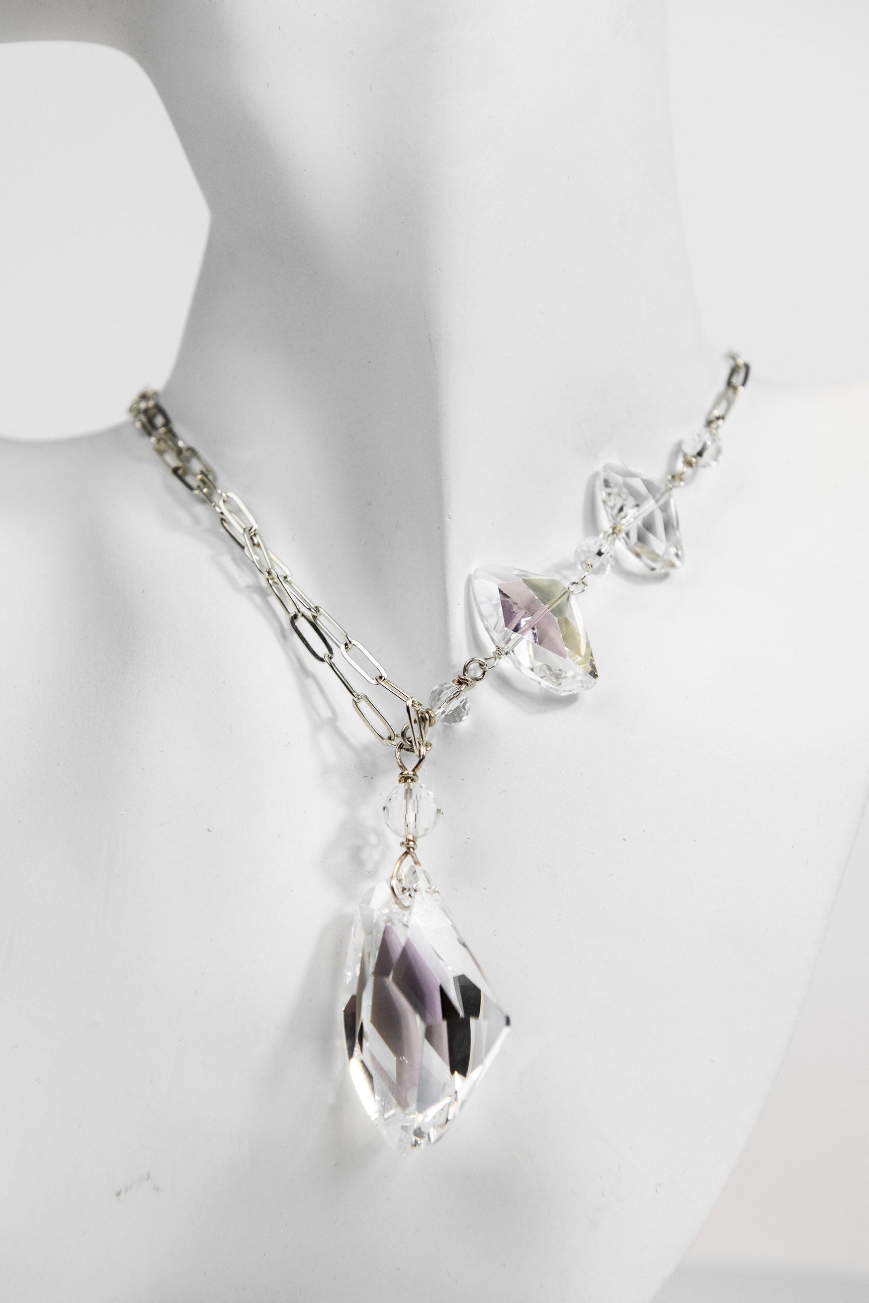 Silver chain link necklace with asymmetrical Swarovski crystals