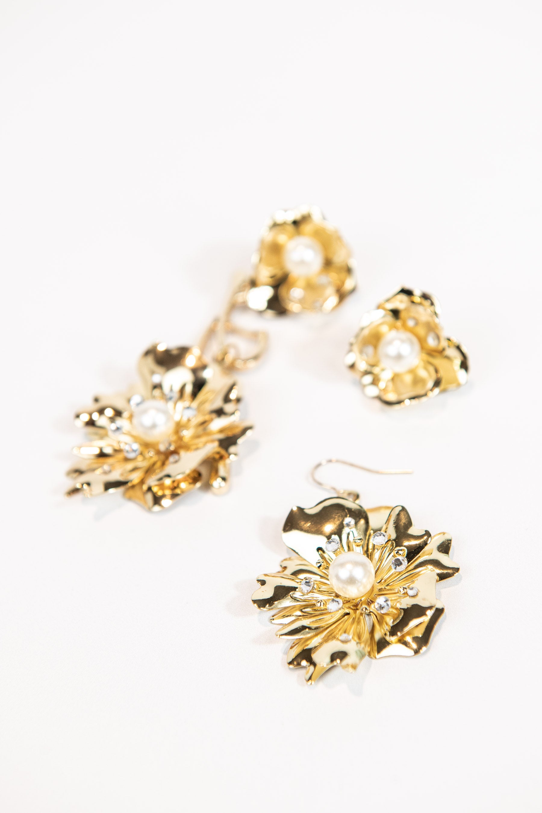 3-piece gold metal asymmetrical pearl and crystal floral earrings with stud or hook options