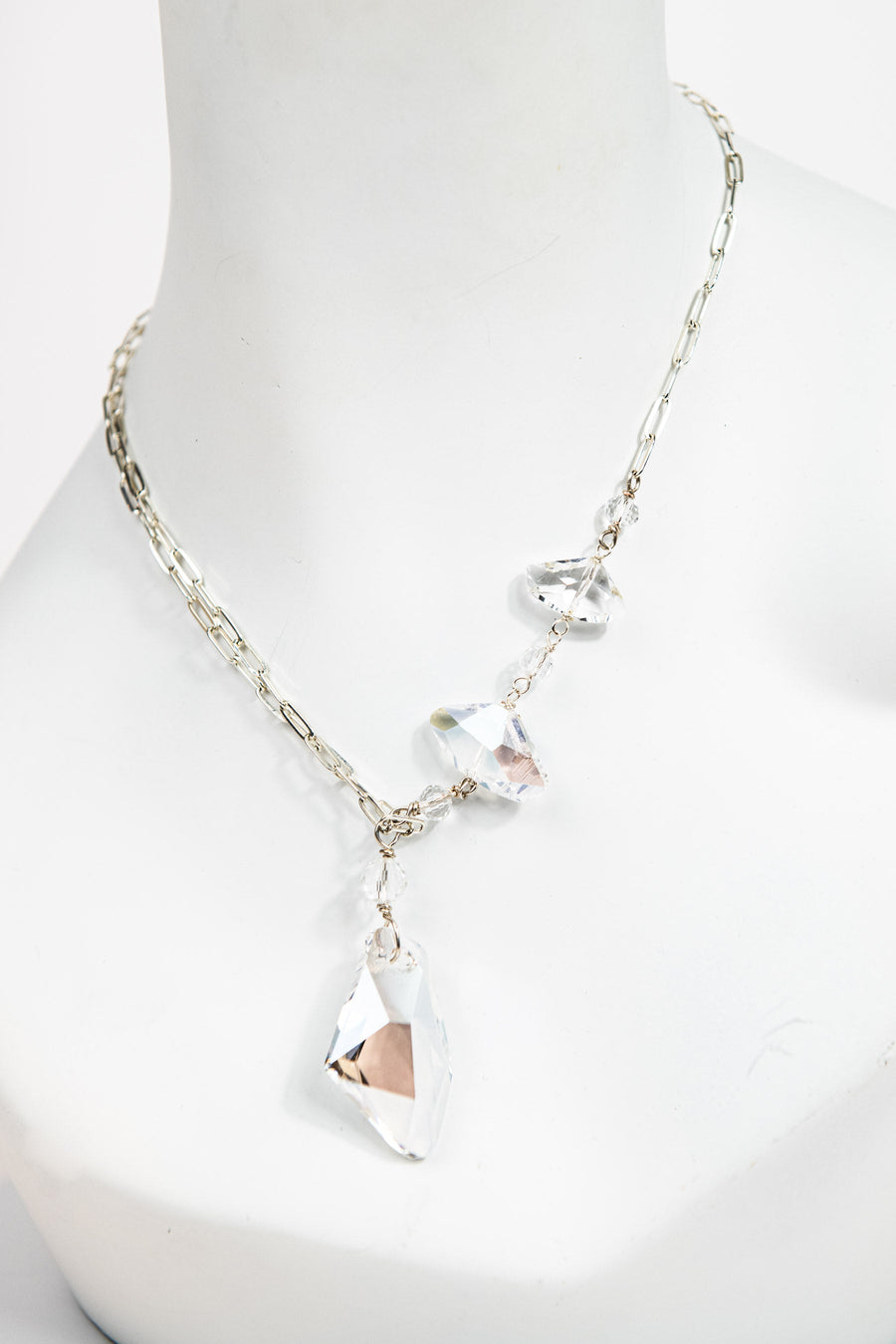 Silver chain link necklace with asymmetrical Swarovski crystals