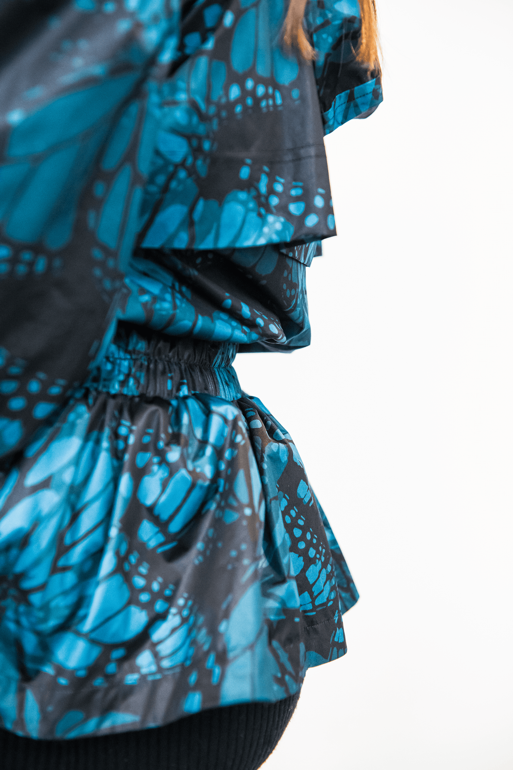 Peplum Monarch Rain Shell