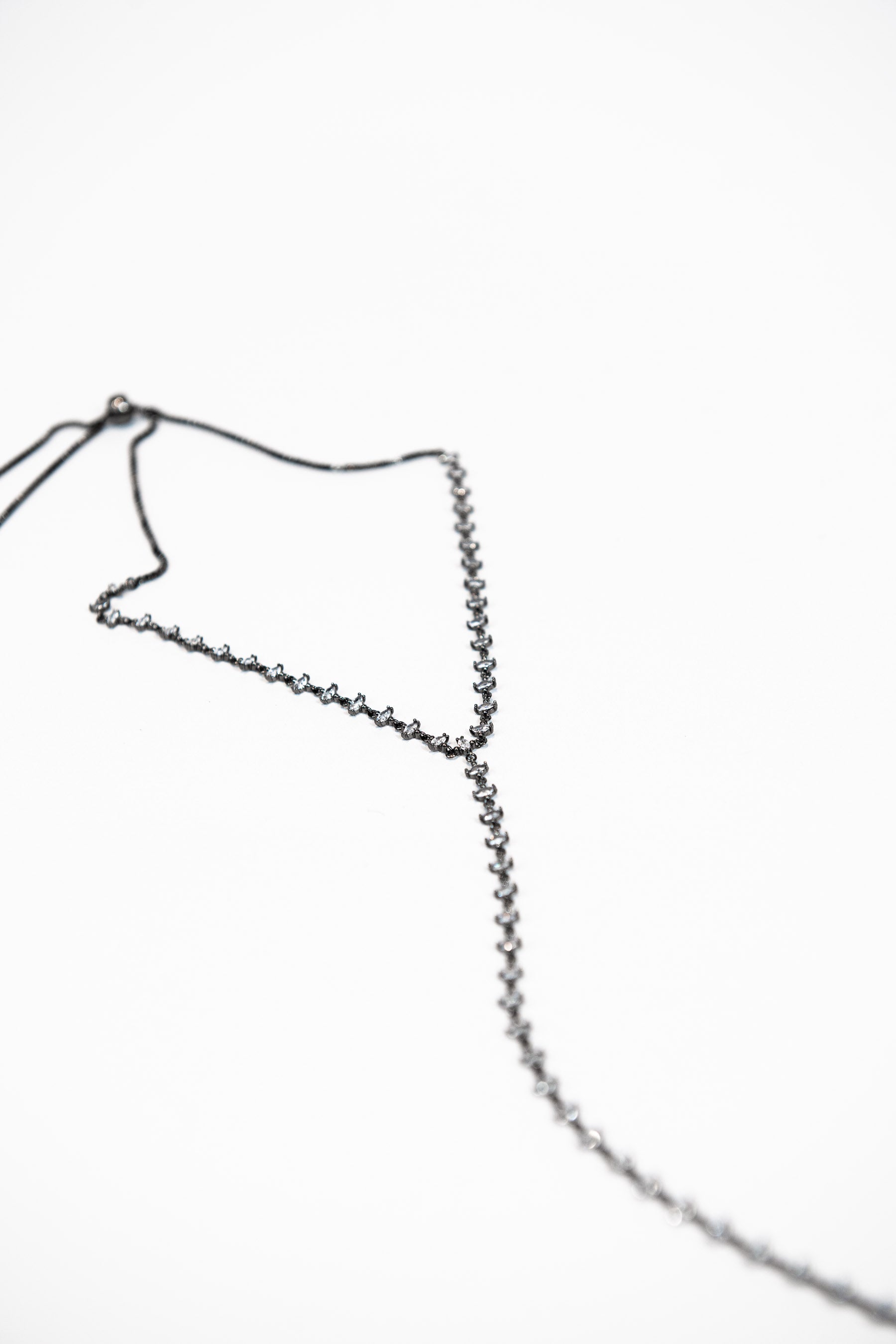 Hand set high quality CZ marquise lariat necklace with gun metal finish